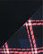 Navy fabric with a diagonal red and white plaid pattern
