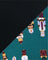 Pattern of nutcrackers on a black and teal background