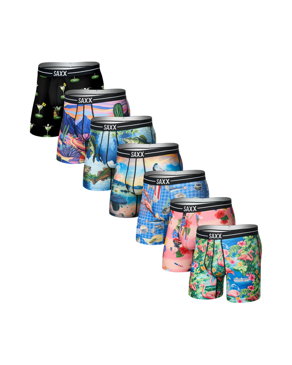 Set of seven SAXX boxer briefs with various colorful designs on a white background
