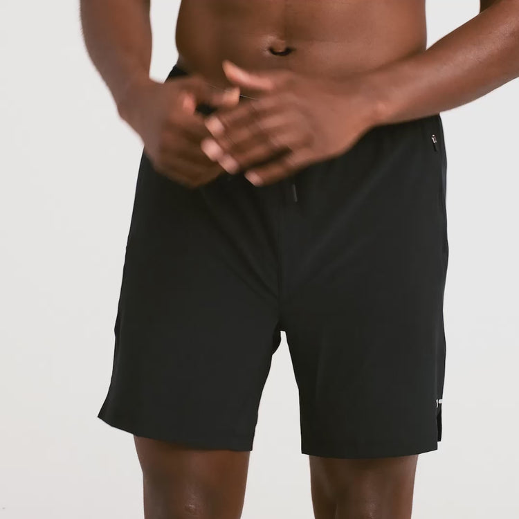 Video of model wearing Power Moves 2N1 Shorts 7"