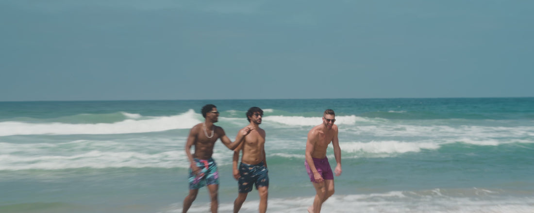 Men in SAXX Swim Shorts have fun on the beach