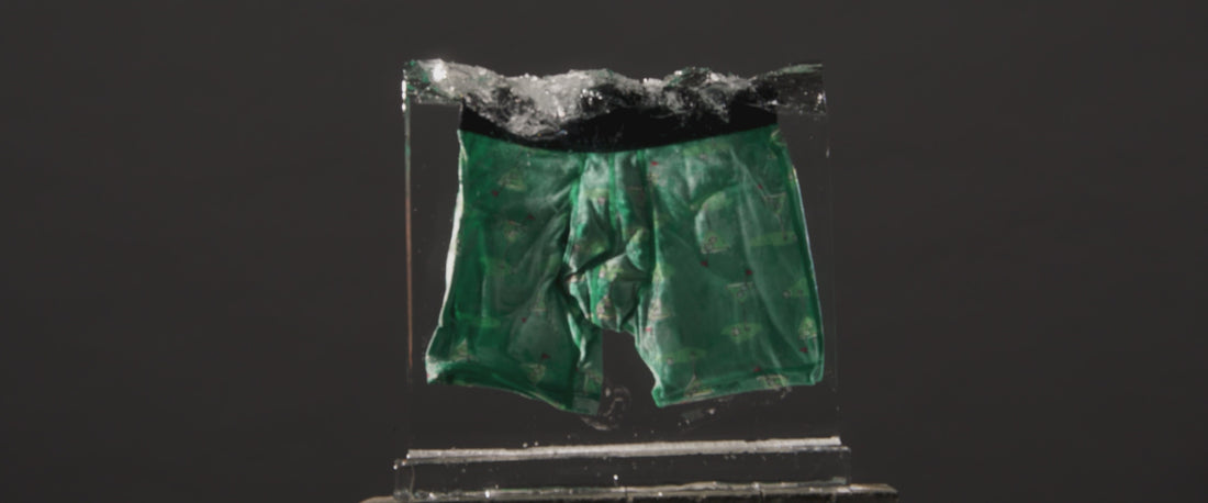 SAXX DropTemp Cooling Cotton boxer briefs frozen in a block of ice