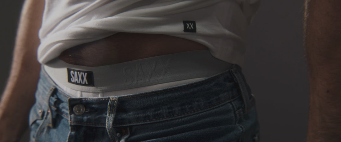 Models wearing SAXX Underwear for various lounge and athletic activities.