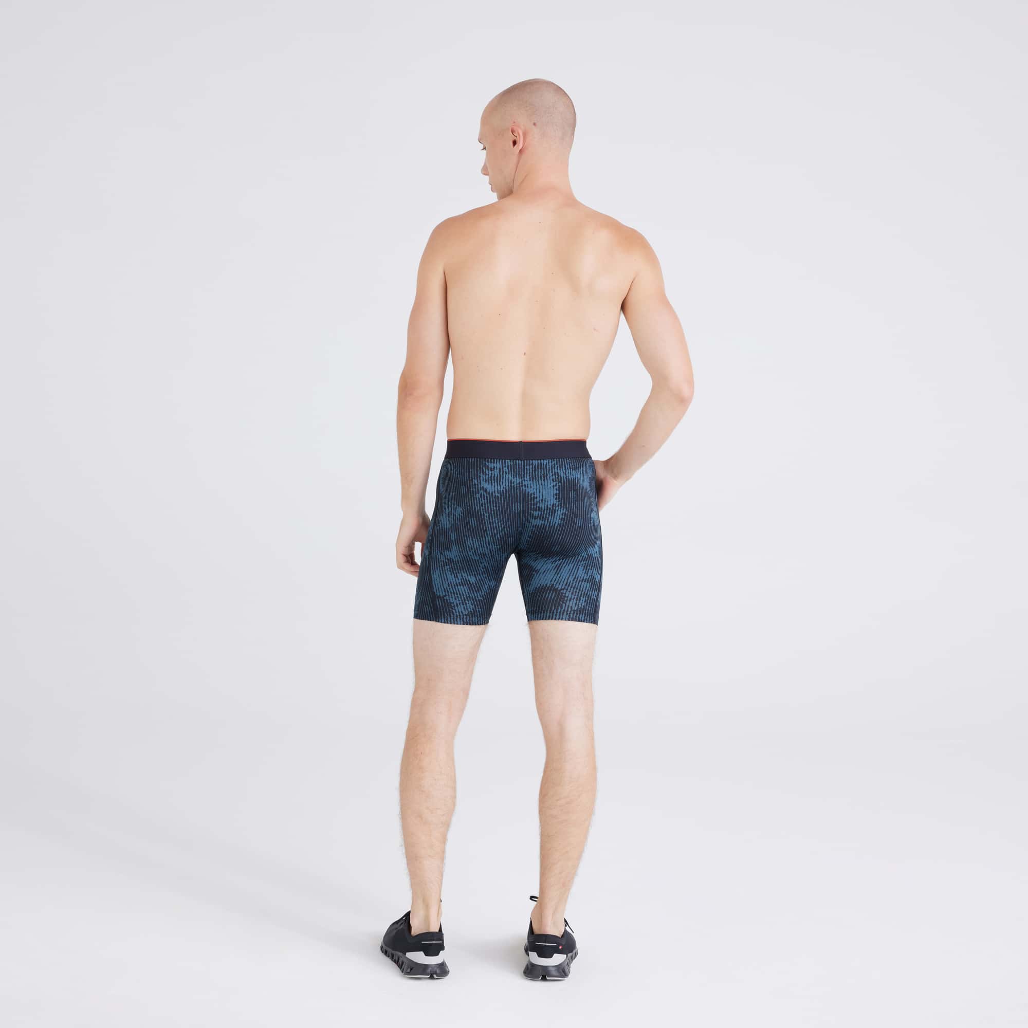 Back - Model wearing Multi-Sport Mesh Boxer Brief in White Noise Daisy-Black