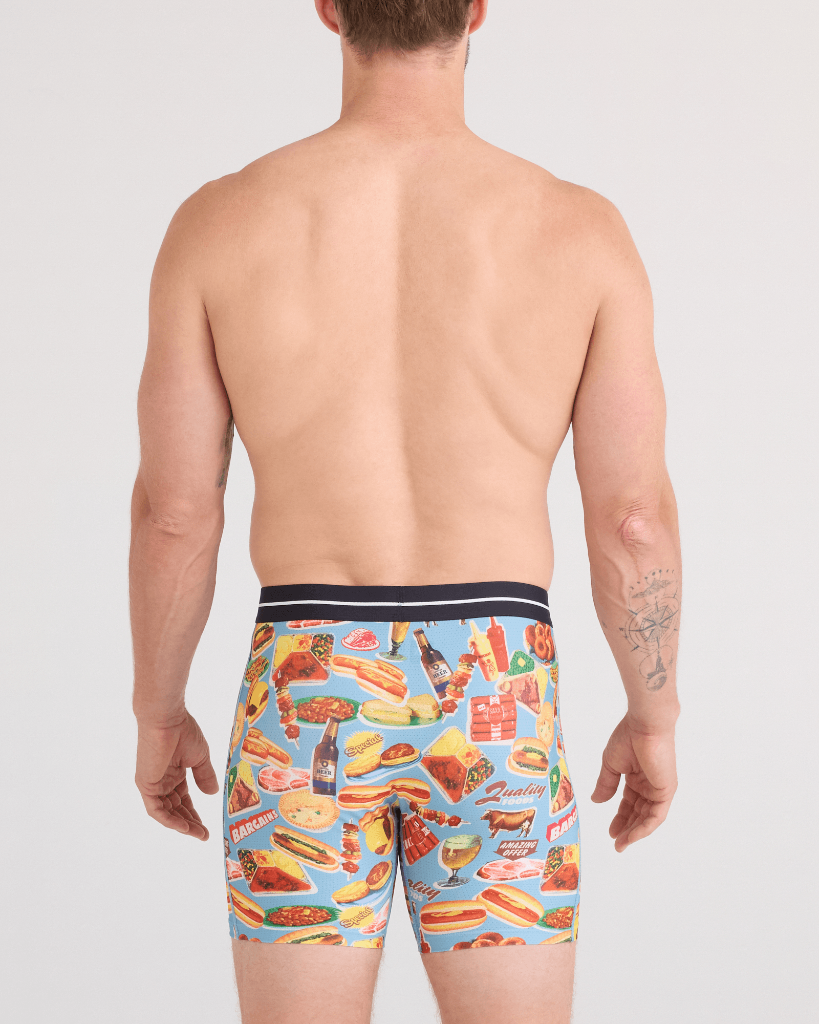 Back - Model wearing  Volt Breathable Mesh Boxer Brief in Quality Foods-Multi