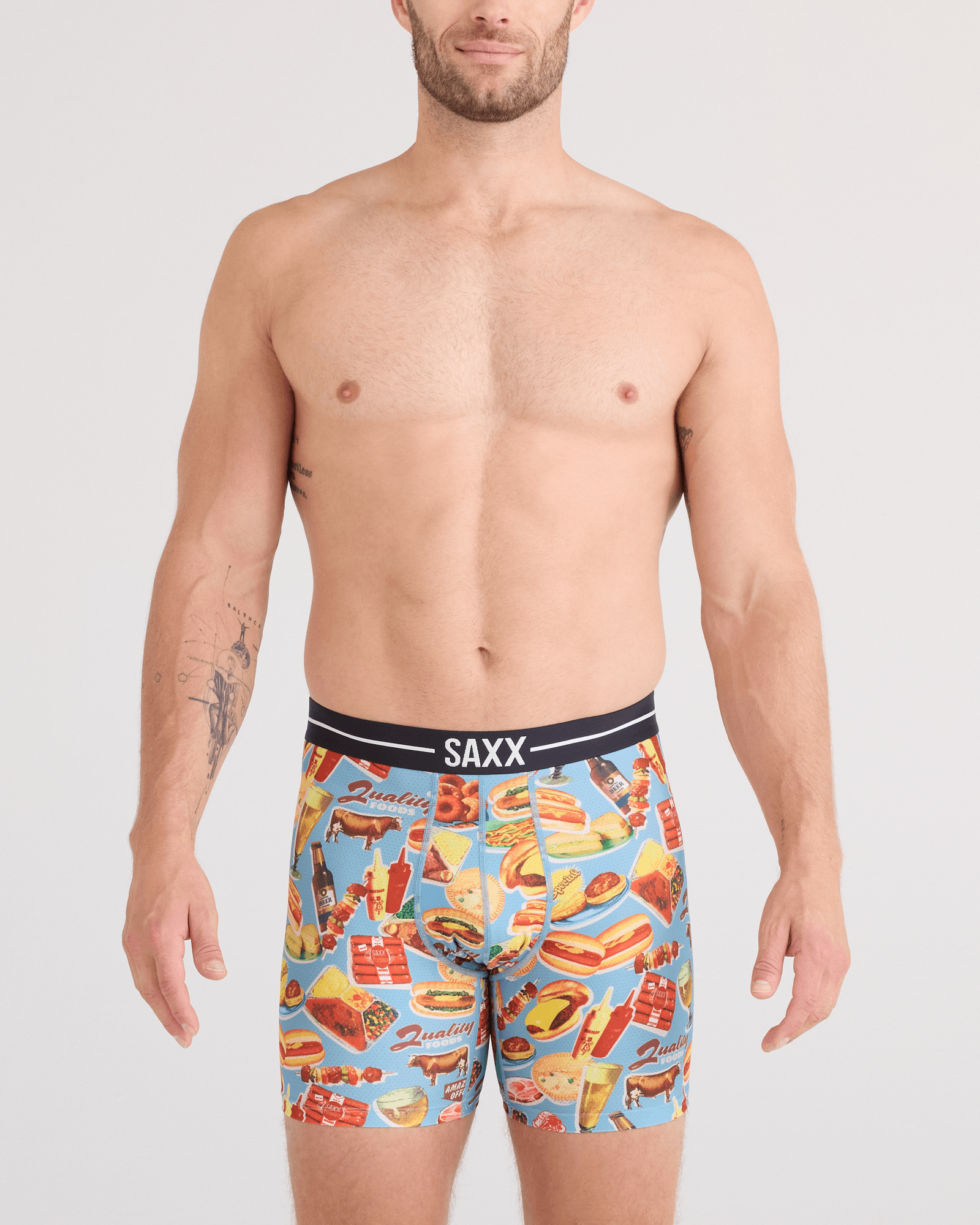 Front - Model wearing  Volt Breathable Mesh Boxer Brief in Quality Foods-Multi