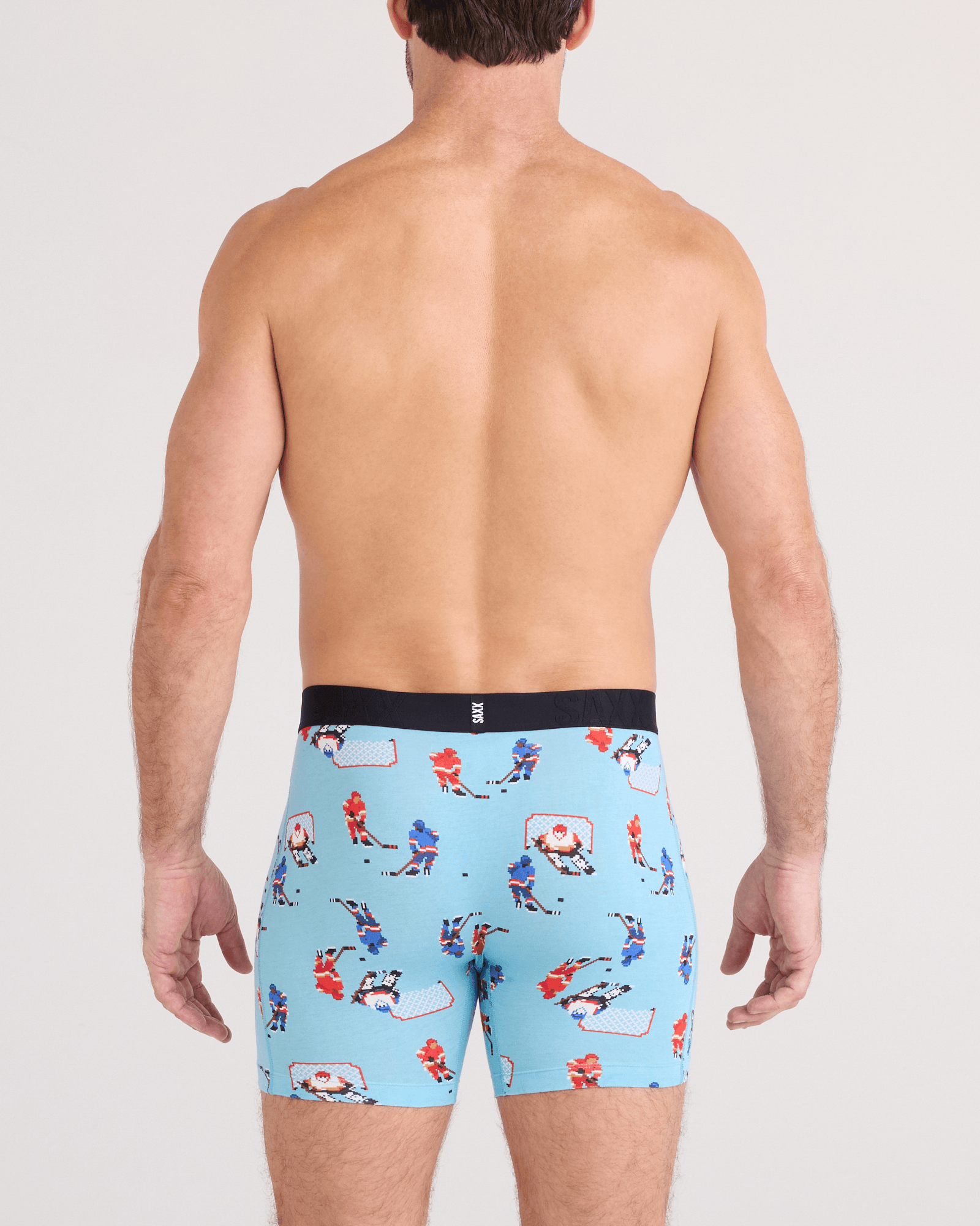 Back - Model wearing  DropTemp Cooling Cotton Boxer Brief Fly in Action On Ice-Blue Tide