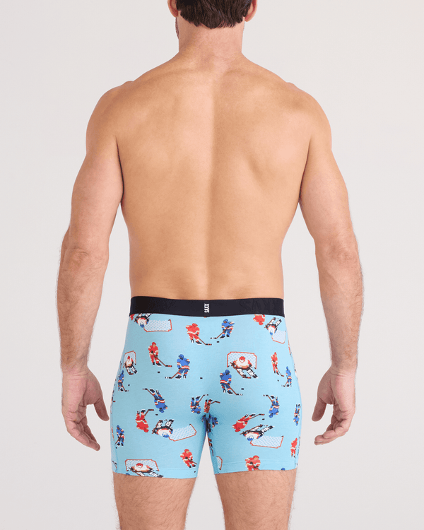 Back - Model wearing  DropTemp Cooling Cotton Boxer Brief Fly in Action On Ice-Blue Tide