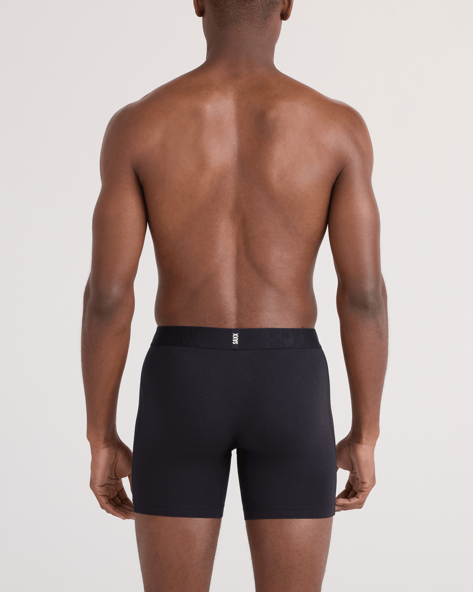 Back - Model wearing  DropTemp Cooling Cotton Boxer Brief Fly in Black