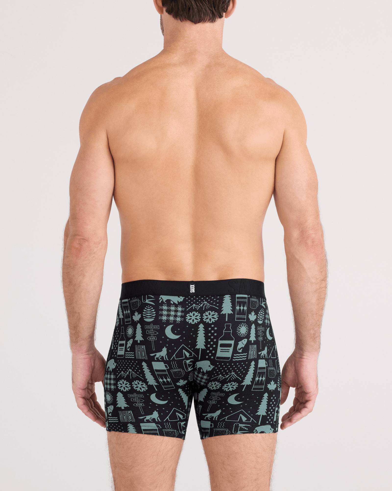 Back - Model wearing  DropTemp Cooling Cotton Boxer Brief Fly in Camp Stamps-Black