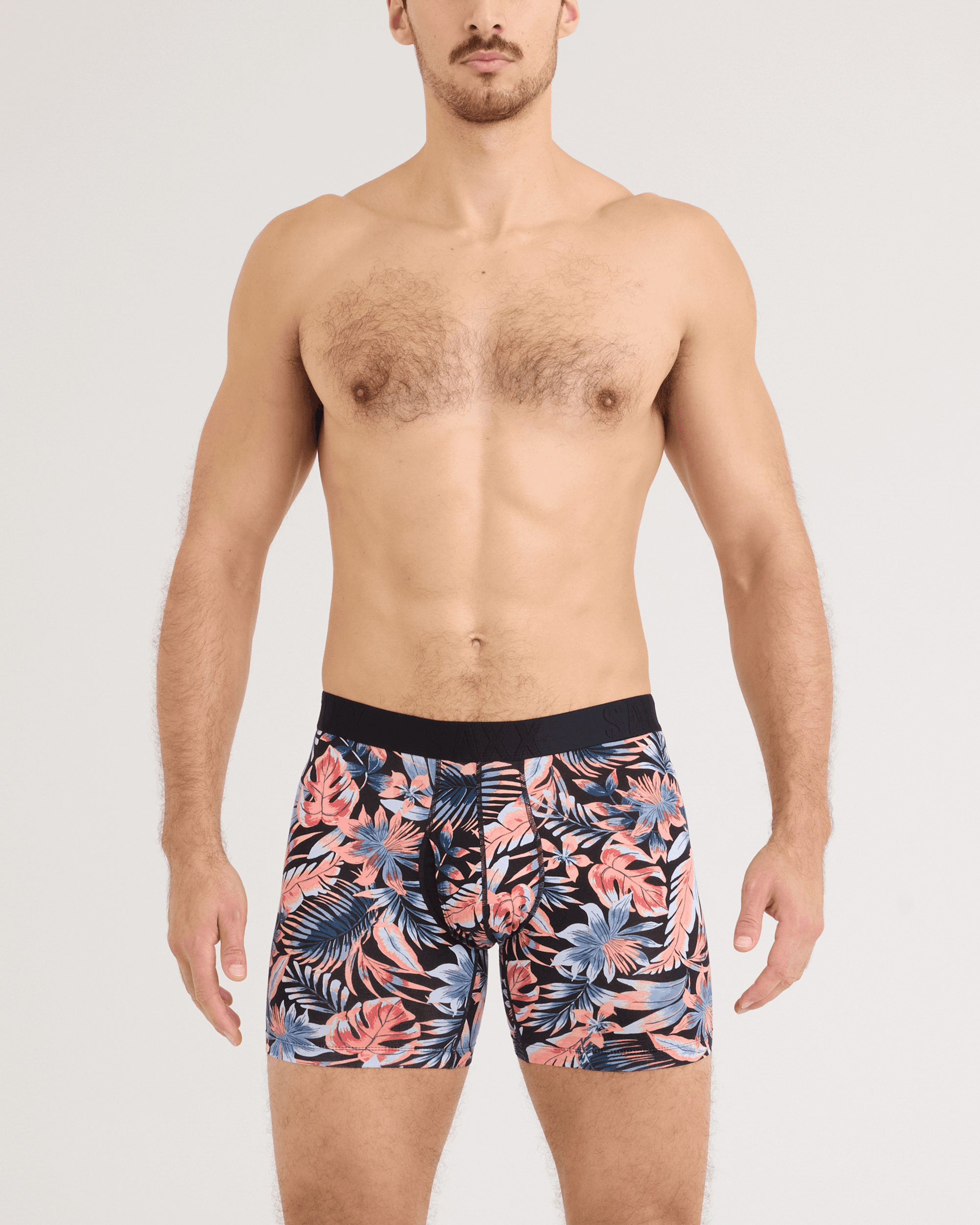 Front - Model wearing DropTemp Cooling Cotton Boxer Brief in Palm Passion-Black