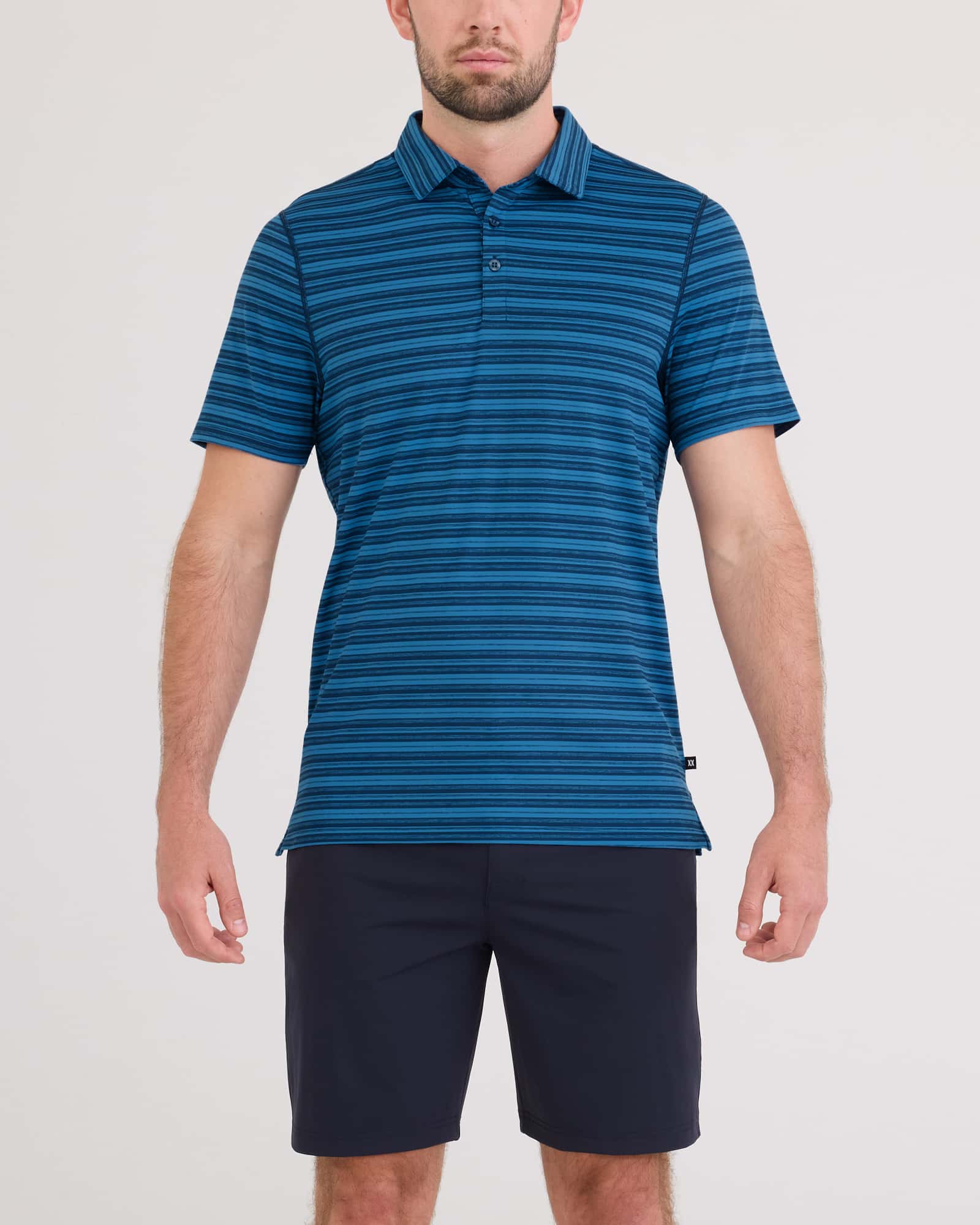 Front - Model wearing Droptemp All Day Cooling Polo in Dark Denim Stripe