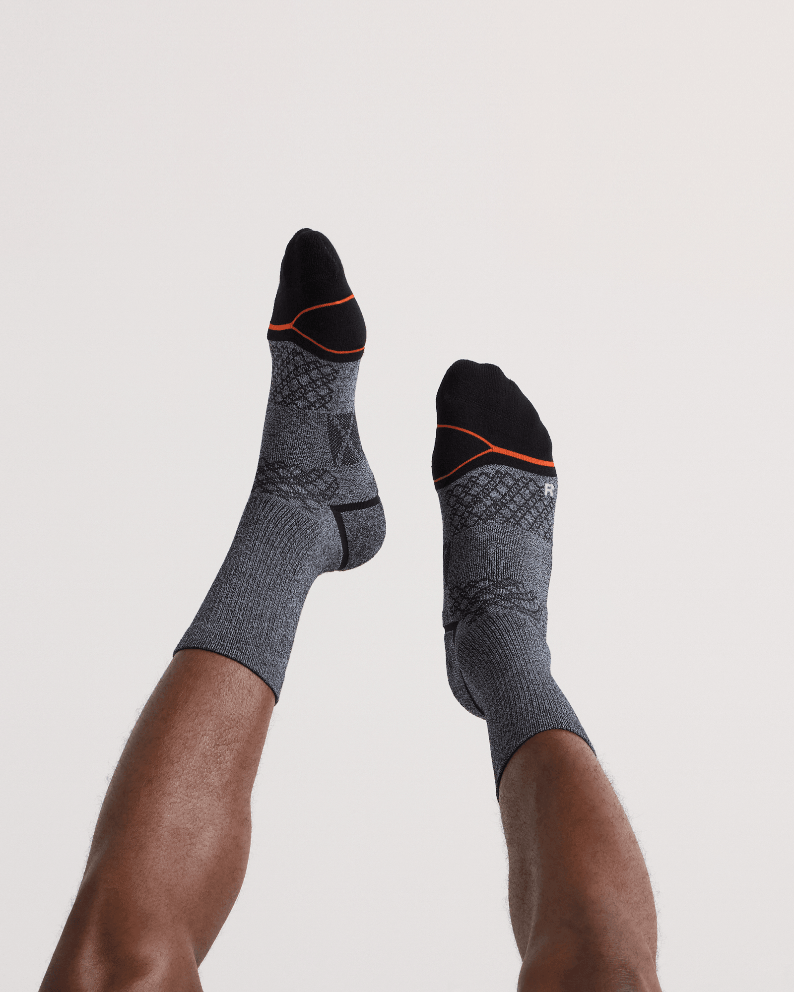Back - Model wearing  Foot Hold Mid-Weight Crew Sock in Black/White