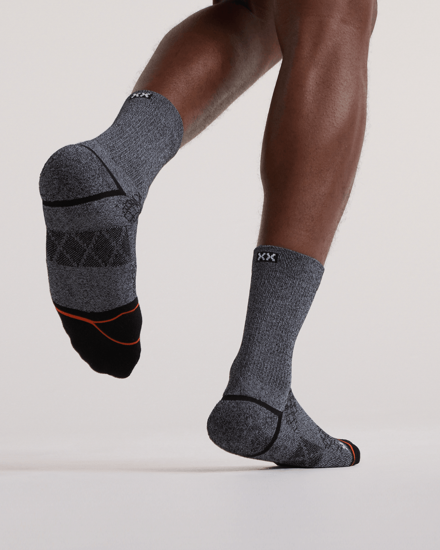 Front - Model wearing  Foot Hold Mid-Weight Crew Sock in Black/White