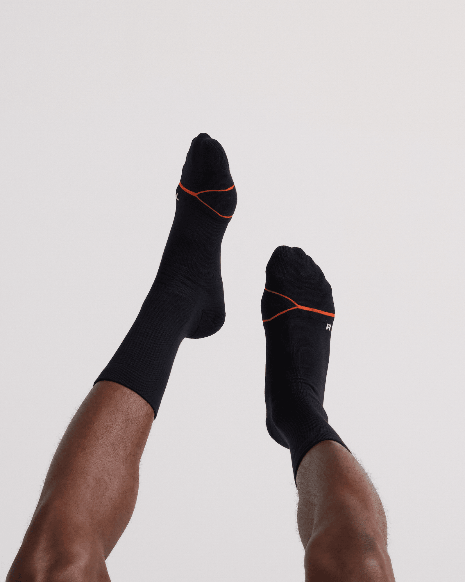 Back - Model wearing  Good Form Crew Sock in Black