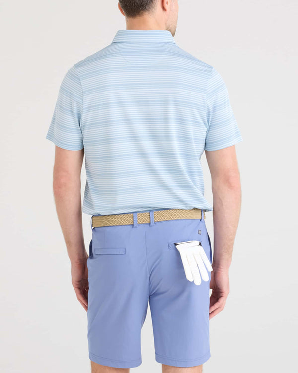 Back - Model wearing Caddie Short 8" in Tidal Blue