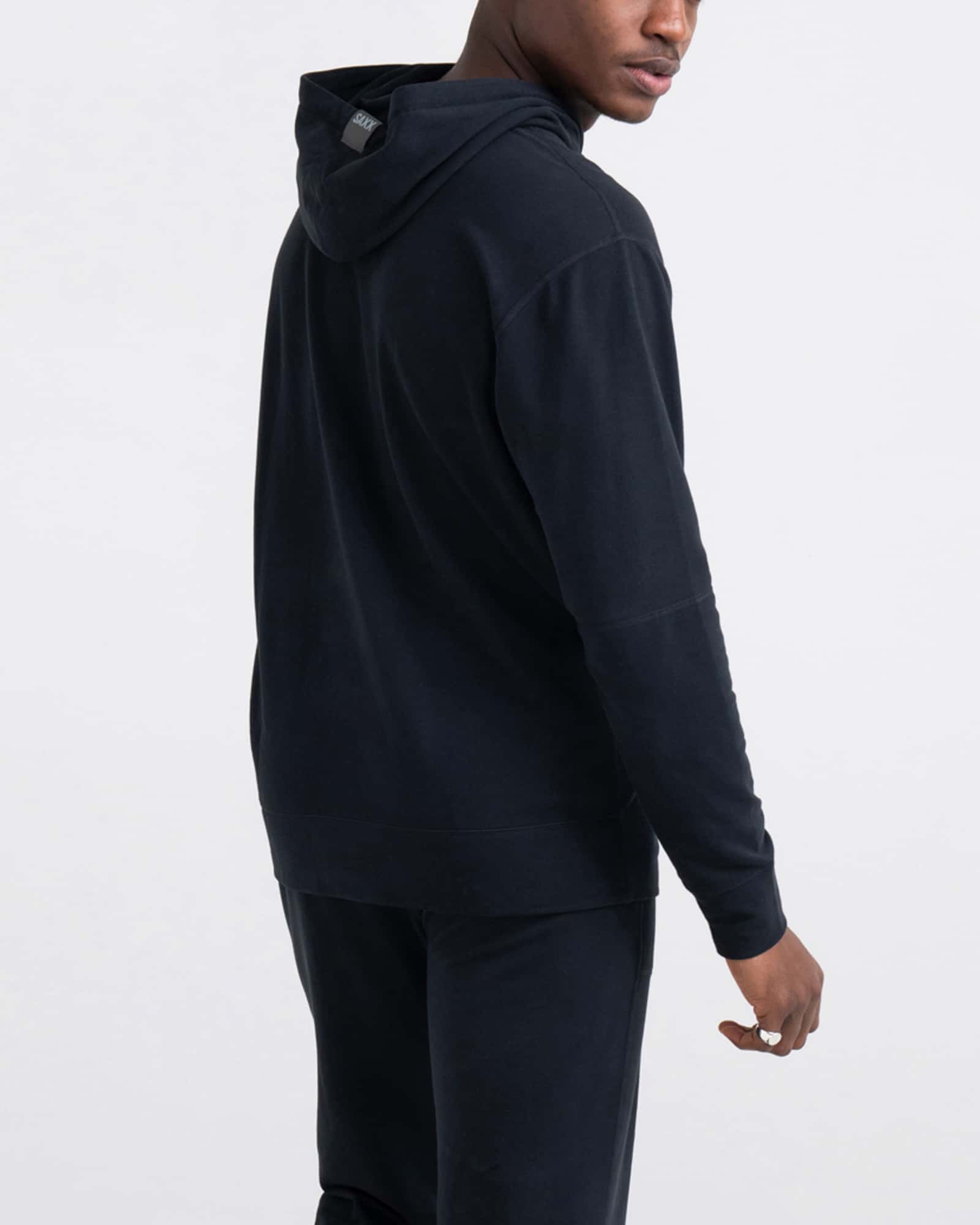Back - Model wearing 3Six Five Hoodie in Black