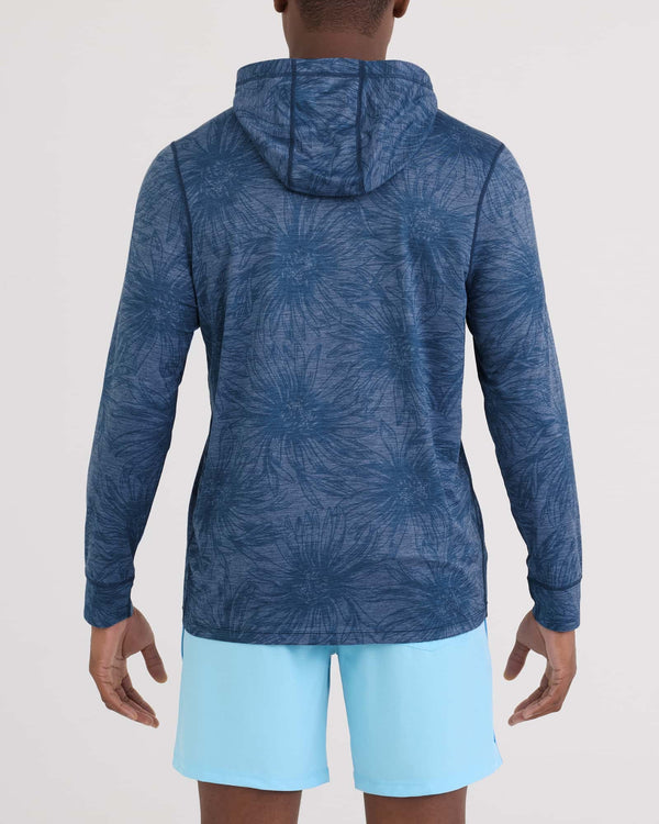 Back - Model wearing Droptemp All Day Cooling Hoodie in Big Daisy-Denim Heather