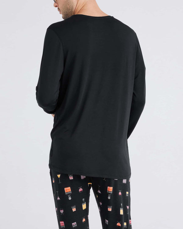 Back - Model wearing Snooze Long Sleeve Tee in Black