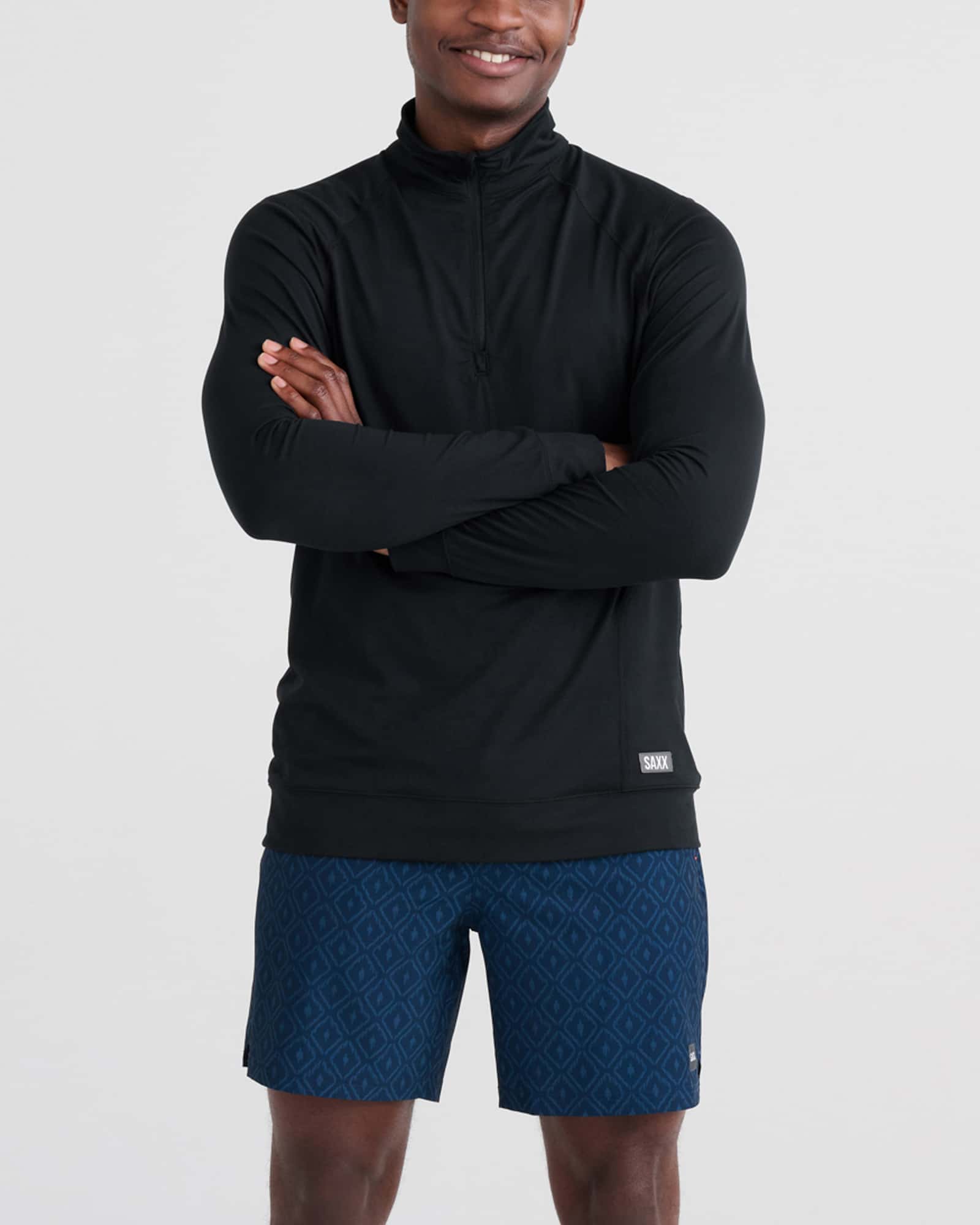 Front - Model wearing Multi-Sport 2N1 Short 7" in Ikat Check-Navy