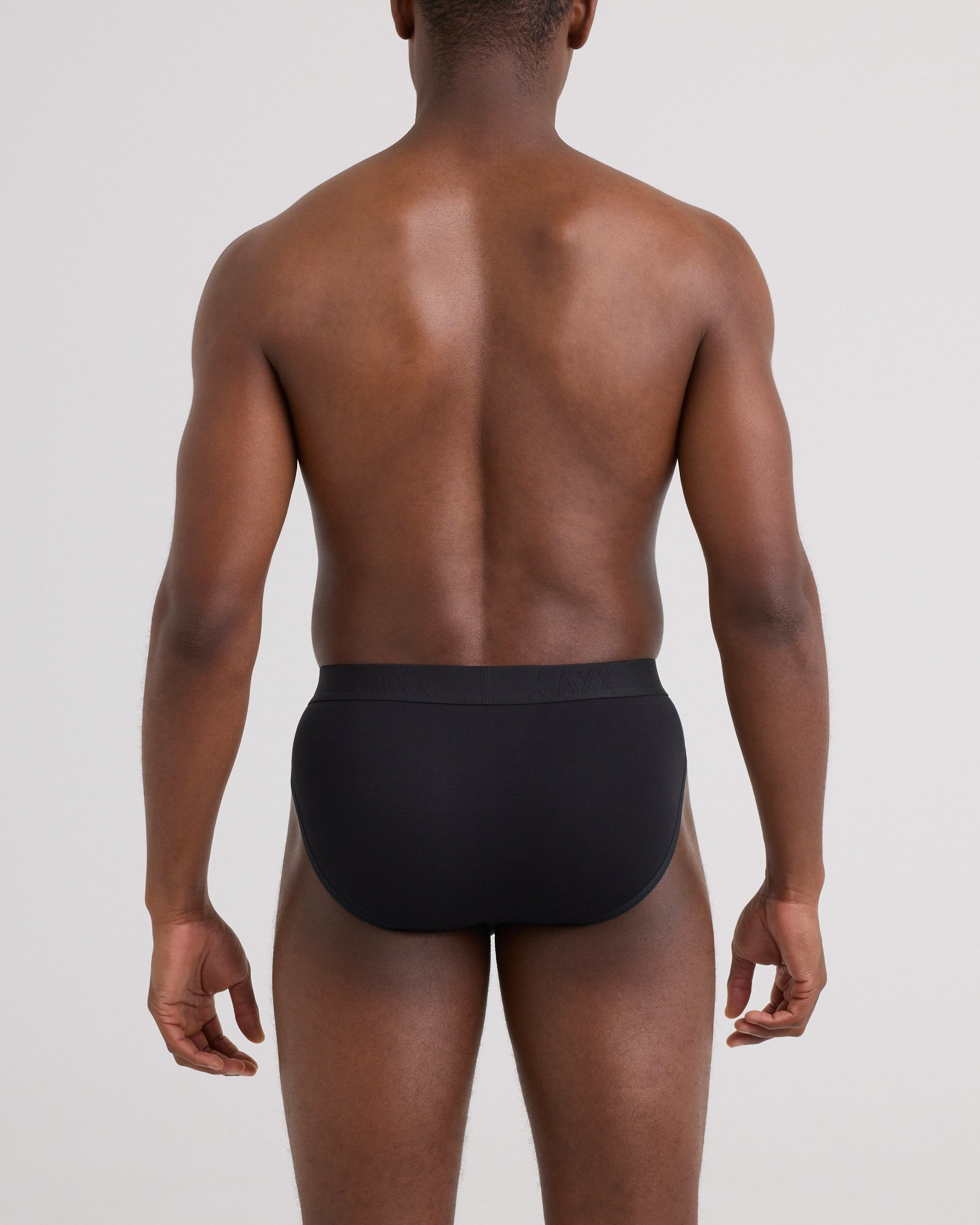 Back - Model wearing Ultra Super Soft Brief in Black