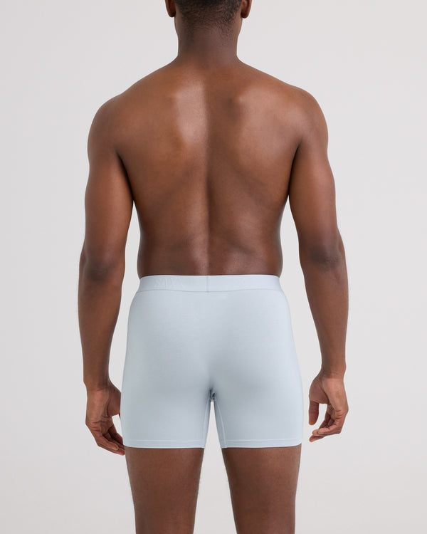 Back - Model wearing Ultra Super Soft Boxer Brief 3 Pack in Black/Pine Blue/Blue Fog