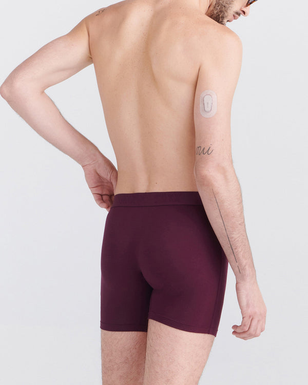 Back - Model wearing Ultra Super Soft Boxer Brief in Burnt Plum