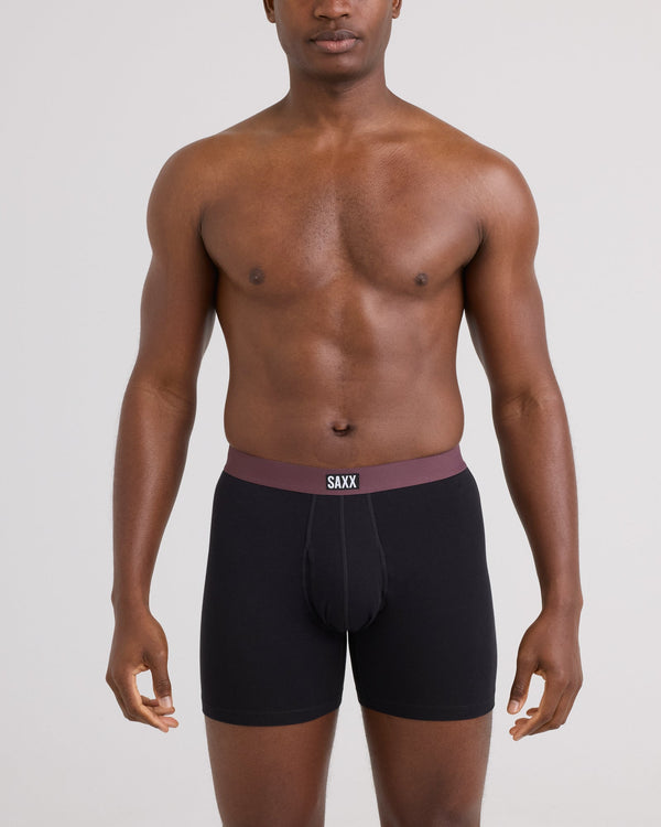 Front - Model wearing Non-Stop Stretch Cotton Boxer Brief 3 Pack in Black/Multi Waistband