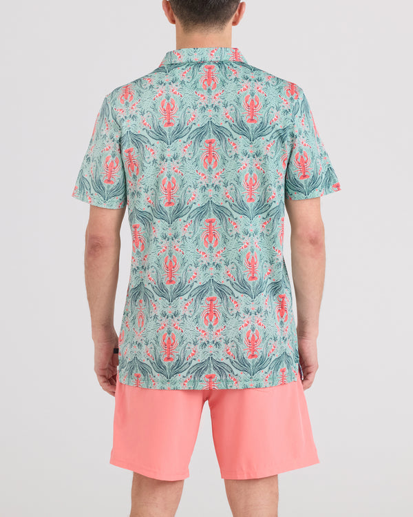 Back - Model wearing Droptemp Dry Resort Polo in Lobster Flourish-Mint
