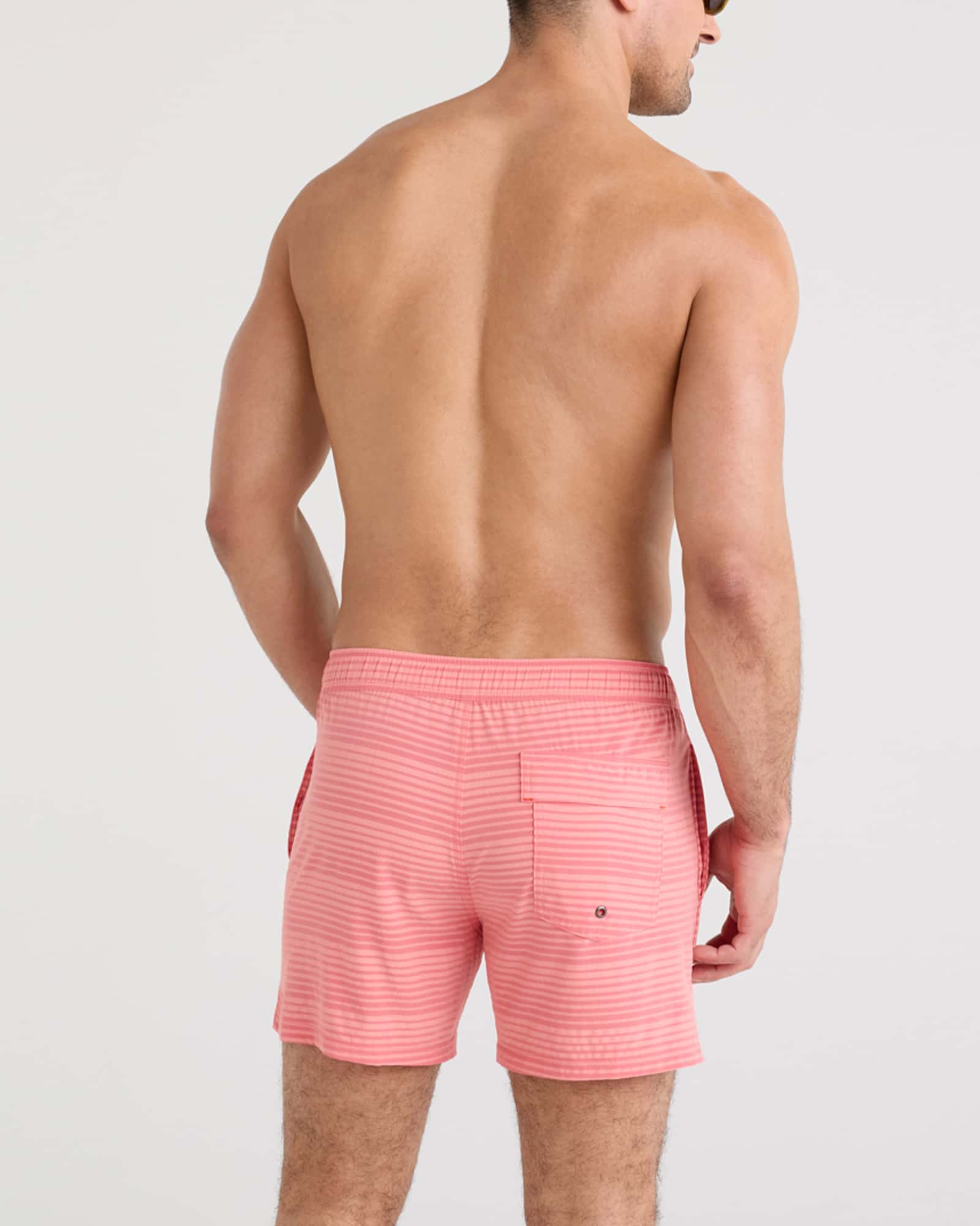 Back - Model wearing Oh Buoy 2N1 Swim Volley 5" in Hibiscus/Coral Pop Stripe