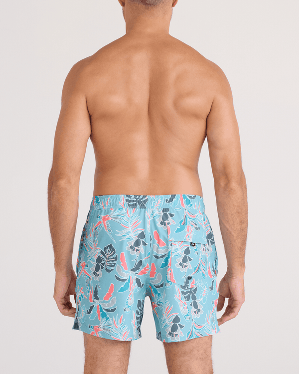 Back - Model wearing  Oh Buoy 2N1 Swim Trunk 5" in Island Tropics-Blue Tide