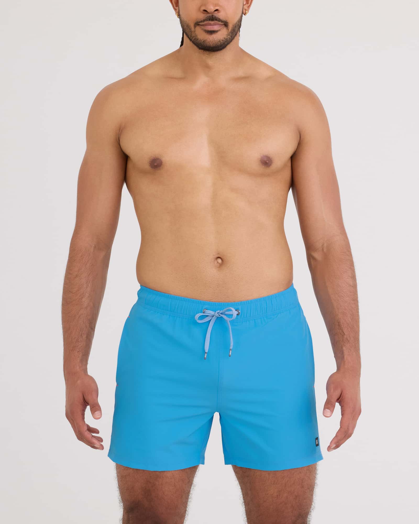 Front - Model wearing Oh Buoy 2N1 Volley 5" in Tranquil Blue
