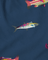 Colorful fish pattern on a blue fabric background