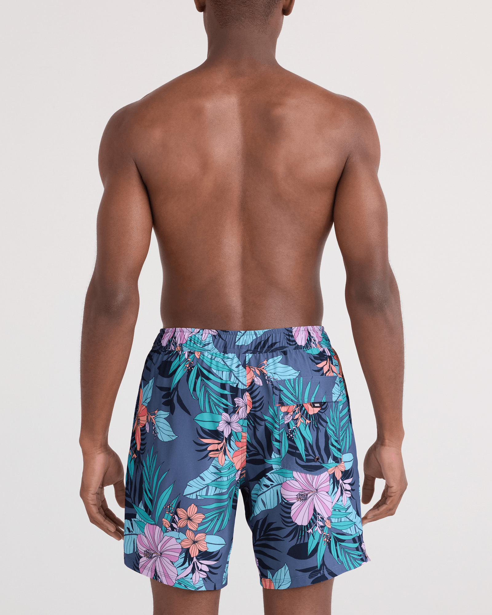Back - Model wearing  Oh Buoy 2N1 Swim Trunk 7" in Hibiscus Jungle-Indigo