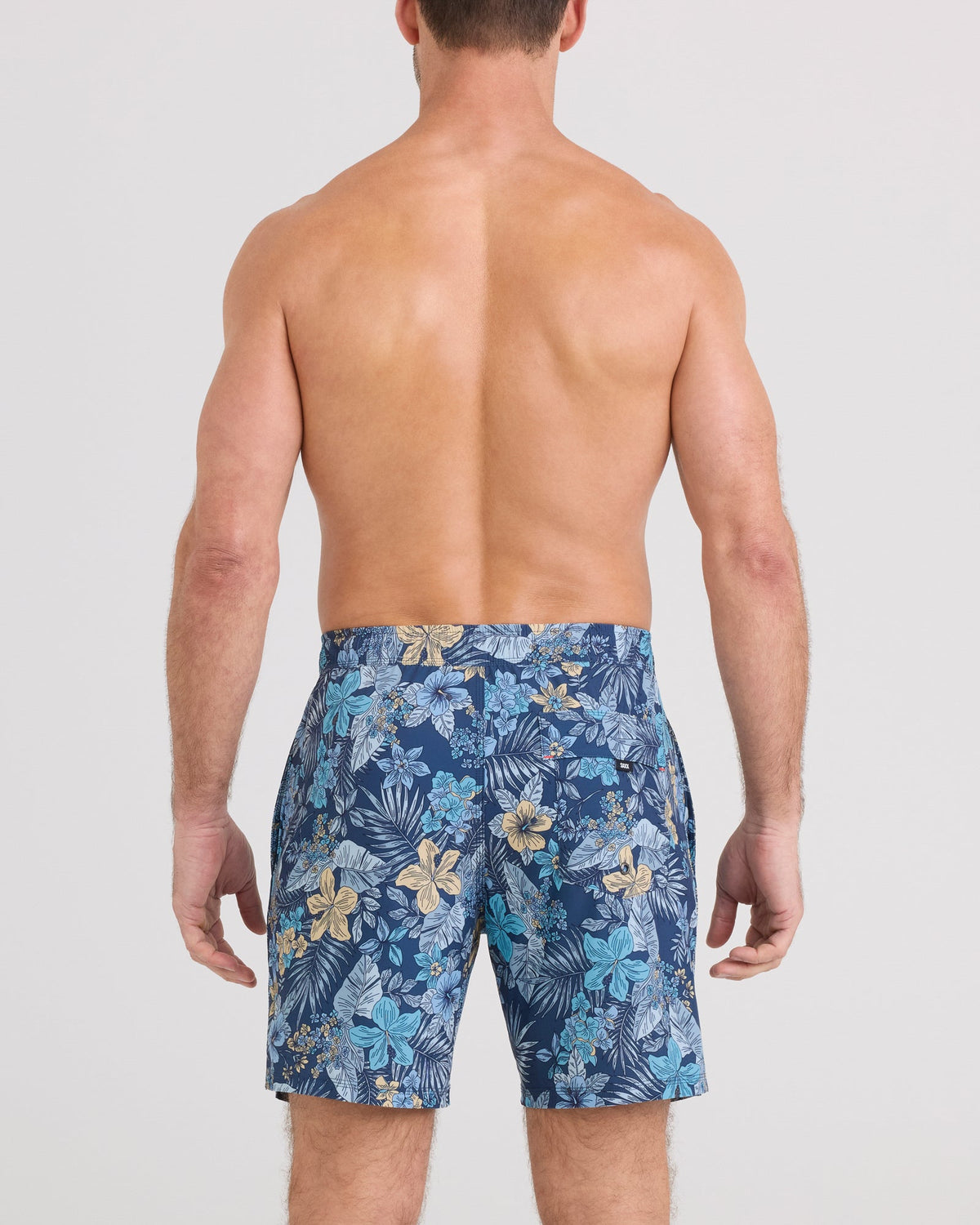 Back - Model wearing Oh Buoy 2N1 Volley 7" in Tropic Burst-Dark Denim