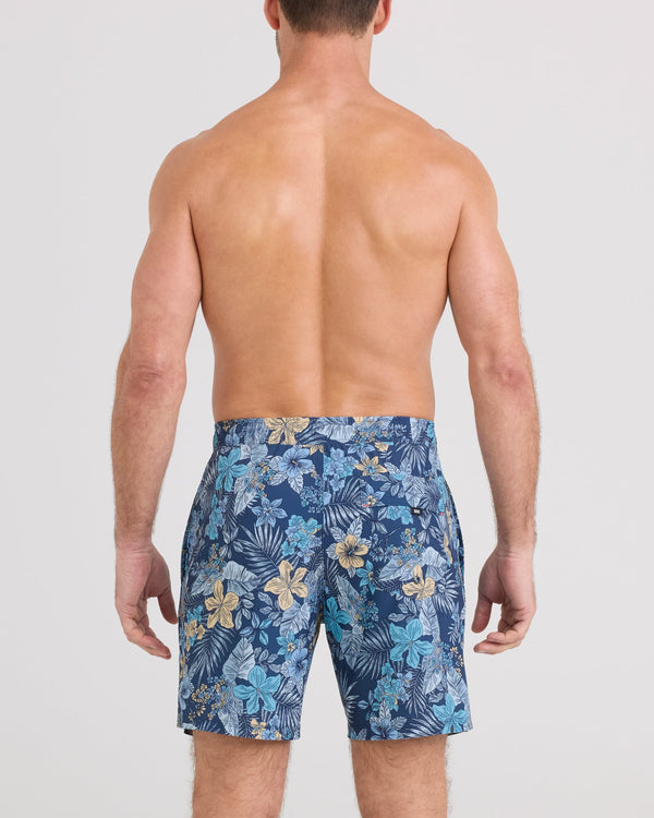 Back - Model wearing Oh Buoy 2N1 Volley 7" in Tropic Burst-Dark Denim