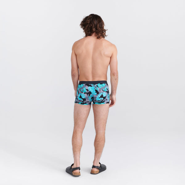 Back - Model wearing Vibe Super Soft Trunk in Island Camo- Black