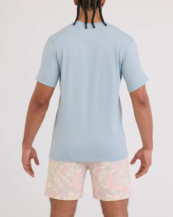 Back - Model wearing Droptemp Cooling Cotton Tee in Blue Fog