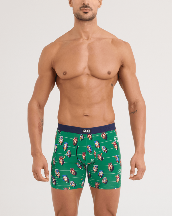 Front - Model wearing Vibe Xtra Soft Comfort Boxer Brief in Armchair QB-Lawn Green