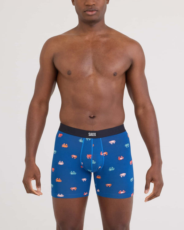Front - Model wearing Vibe Xtra Soft Comfort Boxer Brief Fly in Crab Boil-Navy Dawn