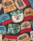 Pattern of various hats with different designs and text on a dark background
