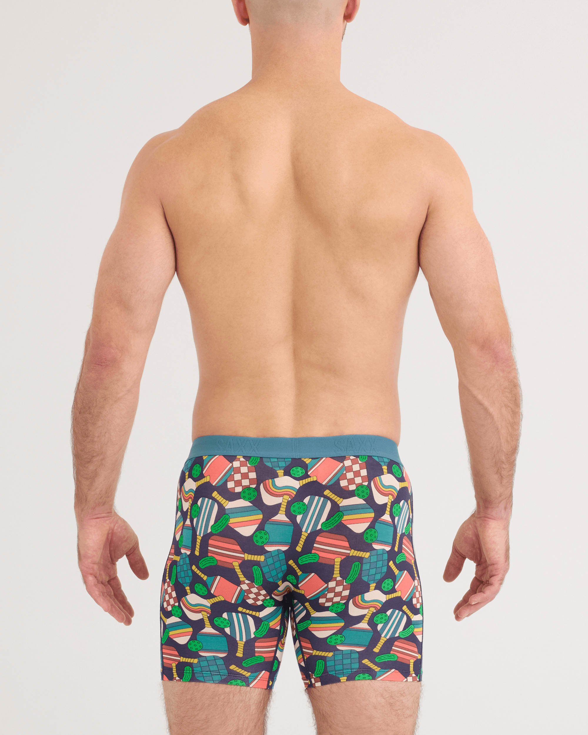 Back - Model wearing Vibe Xtra Soft Comfort Boxer Brief in Dillball-Seascape