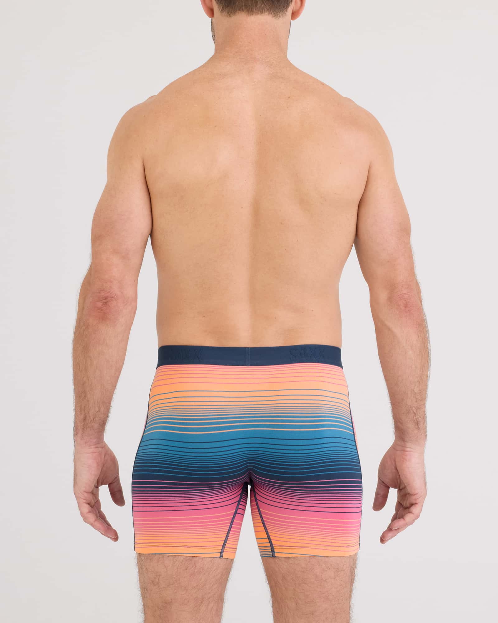 Back - Model wearing Vibe Xtra Soft Comfort Boxer Brief Fly in Hazy Stripe-Sunset