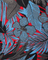 Close-up of a floral pattern with blue flowers and red background
