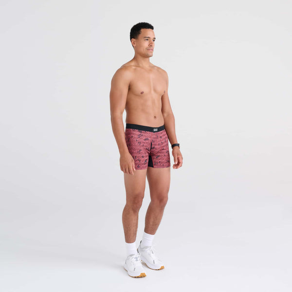 Front - Model wearing DropTemp Cooling Mesh Boxer Brief in Head For The Hills- Red