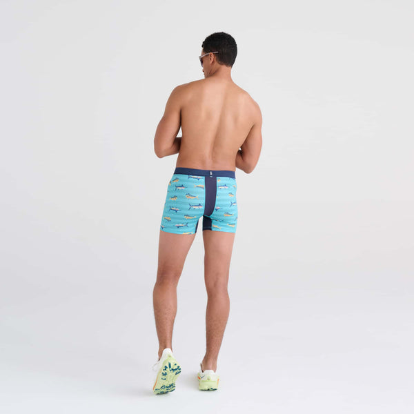 Back - Model wearing DropTemp Cooling Mesh Boxer Brief in Trophy Catch- Turquoise