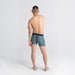 Back - Model wearing DropTemp Cooling Mesh Boxer Brief Fly in Washed Teal Heather