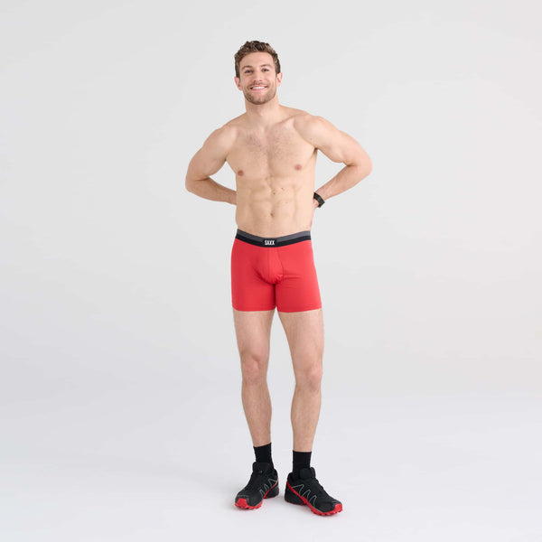 Front - Model wearing Sport Mesh Boxer Brief in Sunset Red
