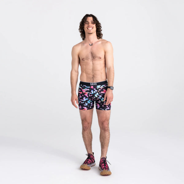 Front - Model wearing Volt Breathable Mesh Boxer Brief in Washed Out Camo- Multi