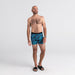 Front - Model wearing Platinum Boxer Brief Fly in Lush Tropics- Racer Blue